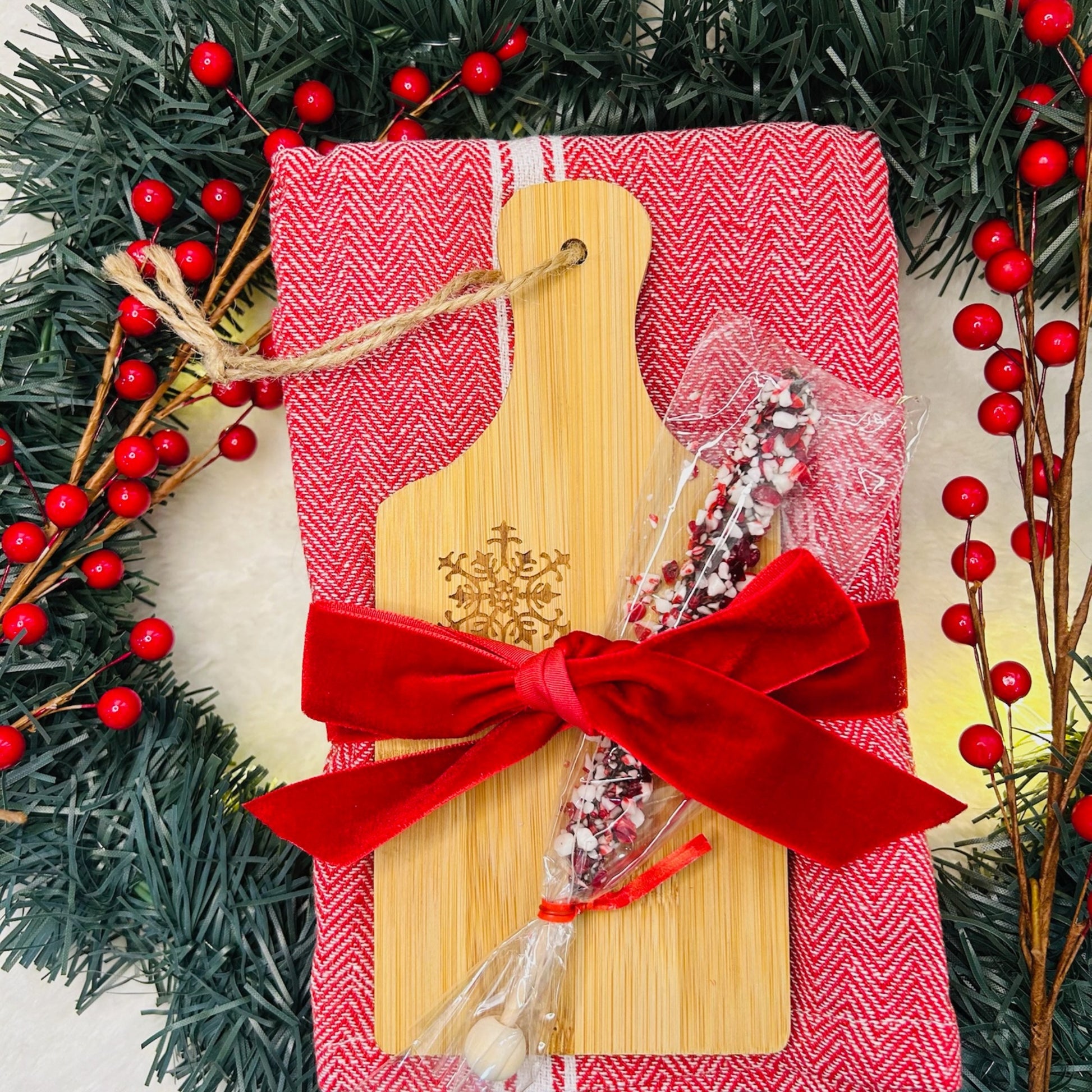Festive dish towel with stir stick and snowflake cutting board.  Christmas gift realtor gift neighbor Christmas gift