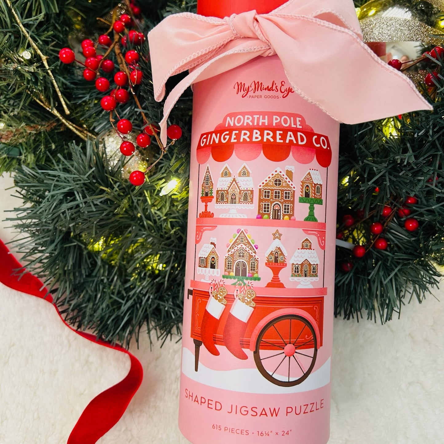 Gift box with north pole gingerbread puzzle, strawberry pretzels and Christmas crackers