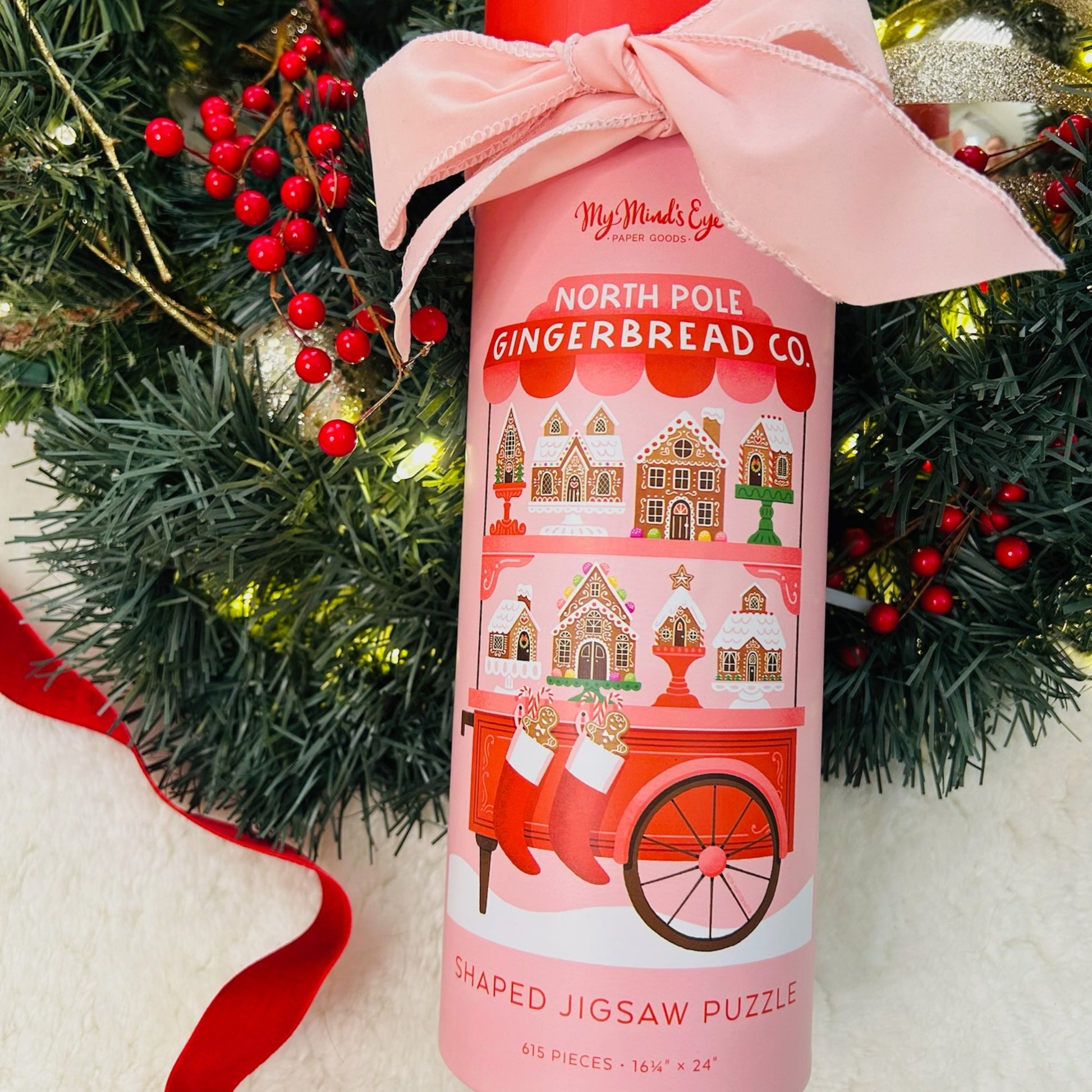 Gift box with north pole gingerbread puzzle, strawberry pretzels and Christmas crackers