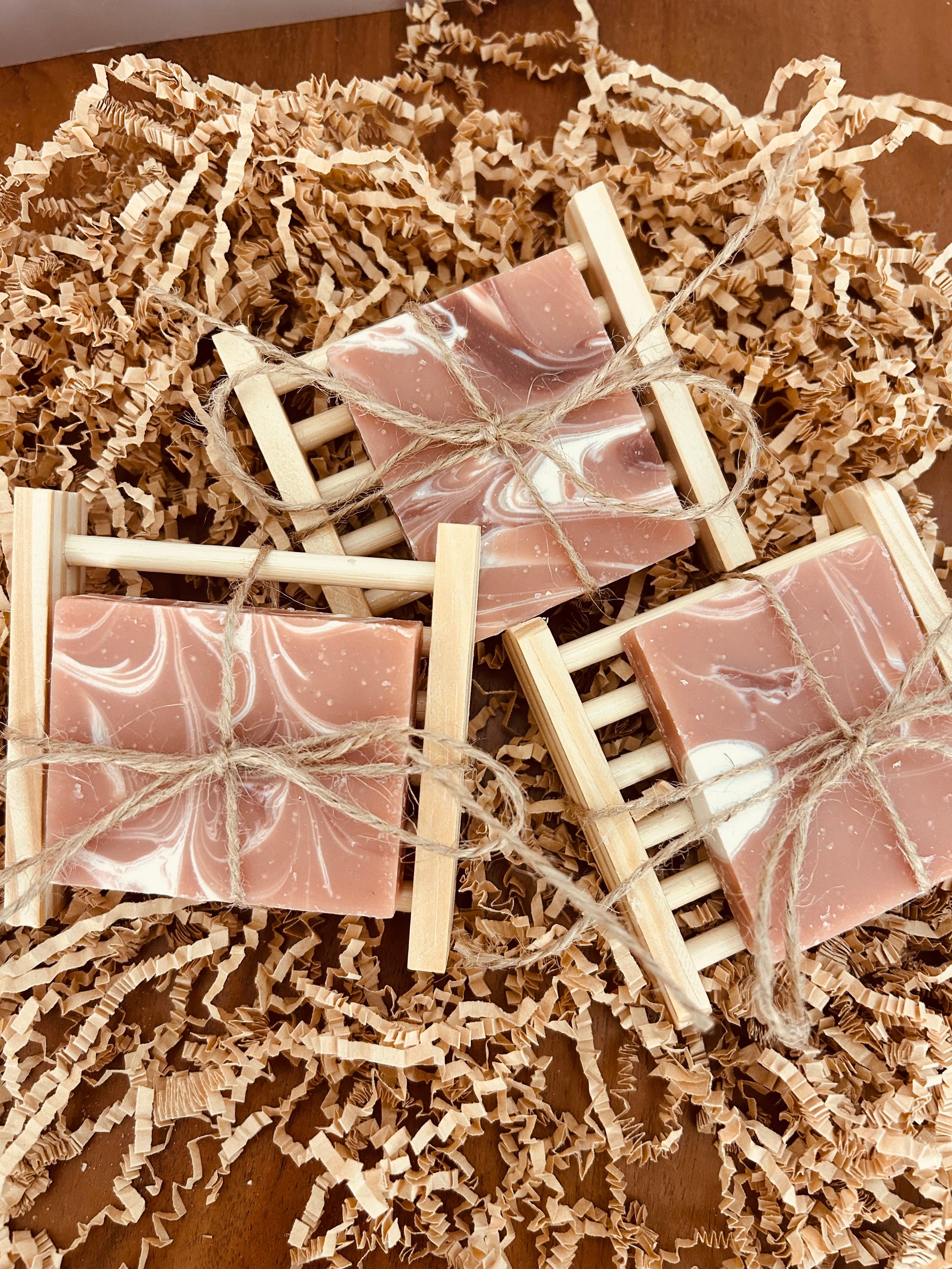 Handmade cinnamon apple soap on a soap dish.