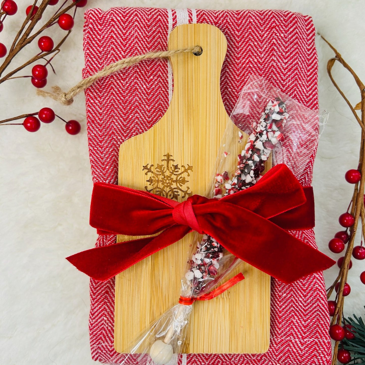 Festive dish towel with stir stick and snowflake cutting board.  Christmas gift realtor gift neighbor Christmas gift